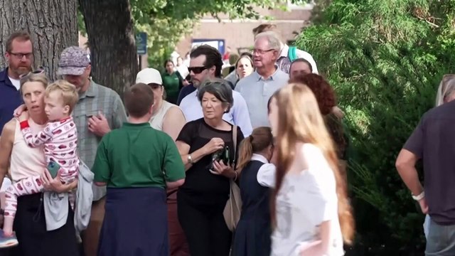 Hugs, kids checking on each other outside shooting at Minneapolis Catholic school