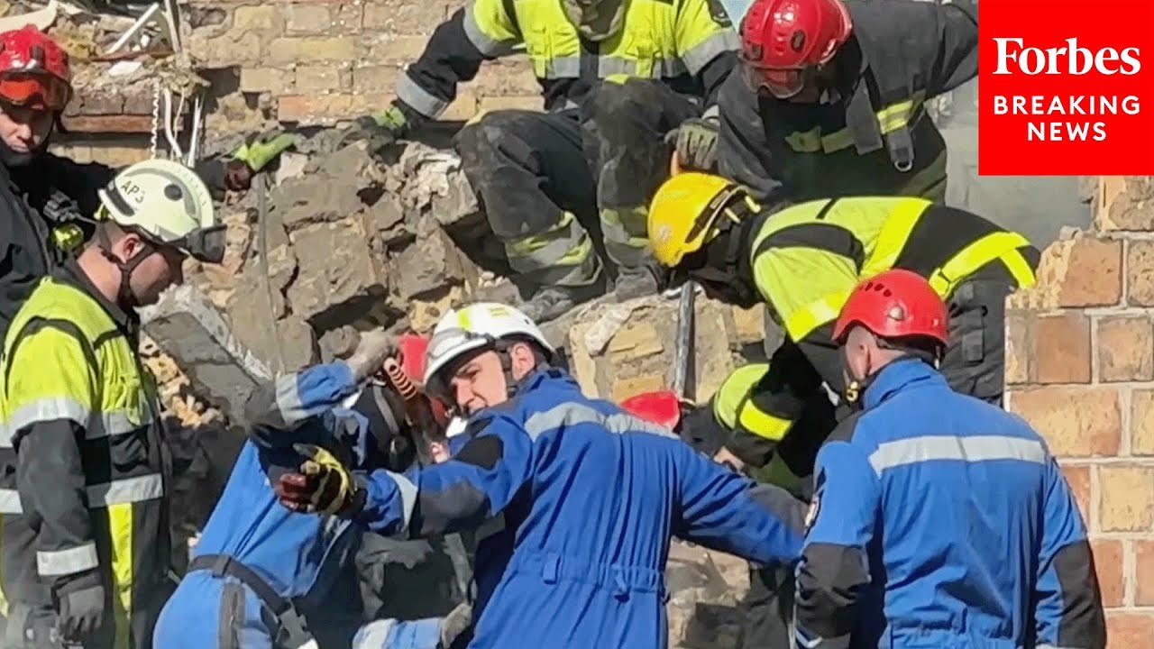 Emergency Crews In Kyiv Work To Rescue Survivors After Heavy Russian Strikes On Ukraine