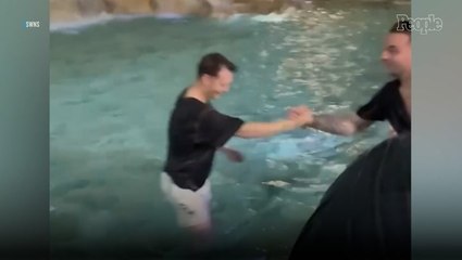 Smirking Tourist Who Jumped Into Rome’s Trevi Fountain’s Smile Drops When Confronted by Police