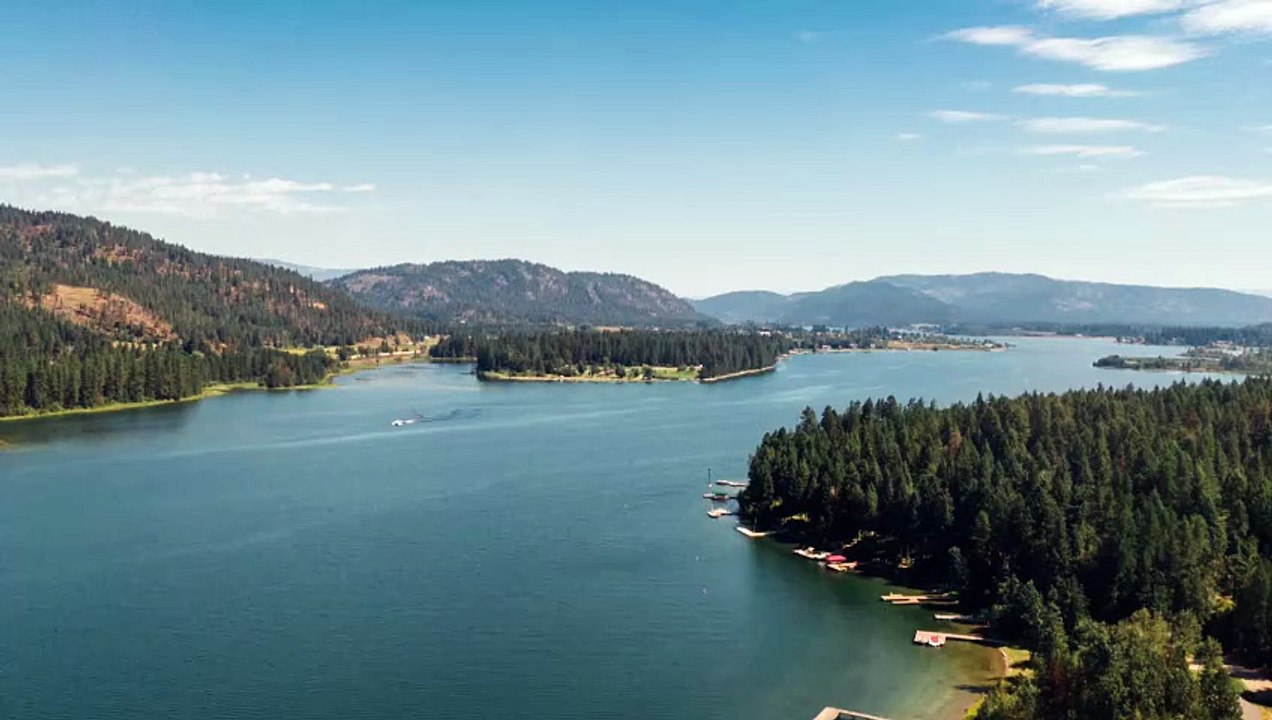 Aerial Footage Of A Lake Surrounded By Mountains