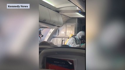 Dramatic moment firefighters board BA flight after passengers and crew 'fell ill'