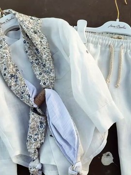 Η Δανάη Μπάρκα έγινε νονά: «Με μαγιό μέσα απ' τα ρούχα» - Το φωτογραφικό άλμπουμ της βάφτισης