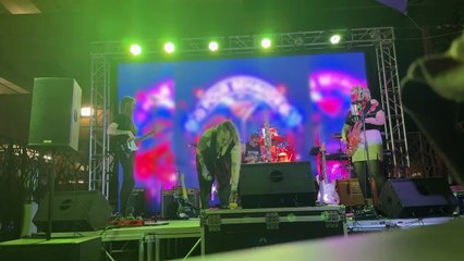 Lead Singer Falls off Stage During Music Performance