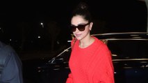 Deepika Padukone aces casual airport fashion in red sweater and denim. Video