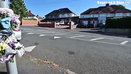 Floral tributes at the scene of a fatal car accident along Thimblemill Road, Smethwick