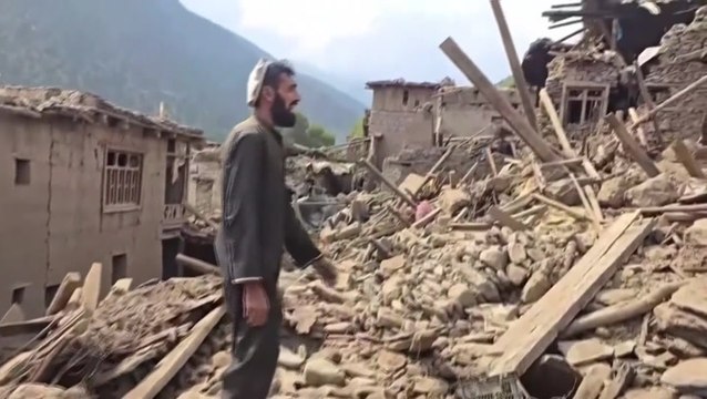 Afghanistan villagers dig through rubble with bare hands in desperate search for earthquake victims