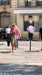 Angus Young strolls around Paris with his wife