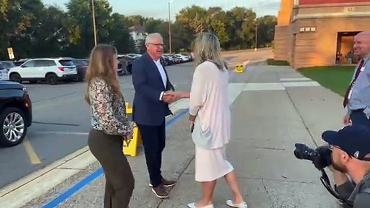 Minnesota Gov. Tim Walz greets educators at Deerwood Elementary School in Eagan