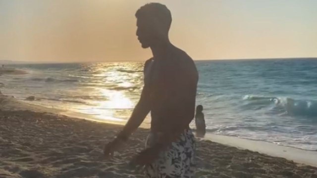 Man tries to nail a backflip on beach but faceplants into the sand instead