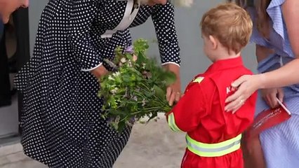 Queen Camilla given flowers after naming new air ambulance