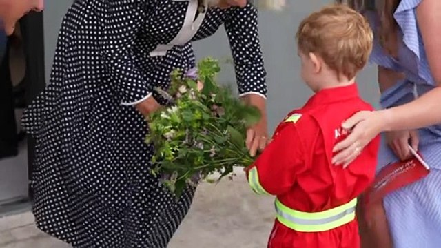 Queen Camilla given flowers after naming new air ambulance
