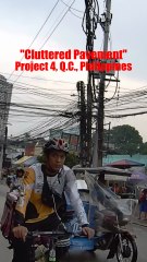 Cluttered Pavement in Quezon City in the Philippines