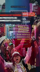With brooms in hand as symbol for change, Indonesian women join Jakarta protests