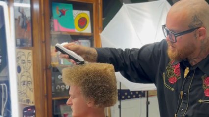 Lad looks ready to embark on a pixelated adventure after getting a picture-perfect Minecraft haircut