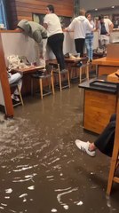 Heavy Rain Floods Coffee Shop in Coyoacan, Mexico