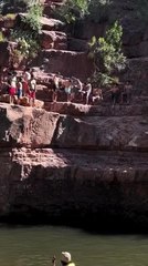 Man Collides With Bystander and Hits Rock During Cliff Jump