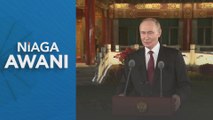 Putin on Trump's conspiracy comment: He has a sense of humour