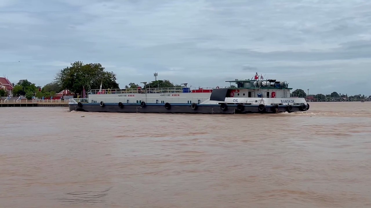 Oil Tanker Sailing on Chao Phraya river at Koh Kret Thailand