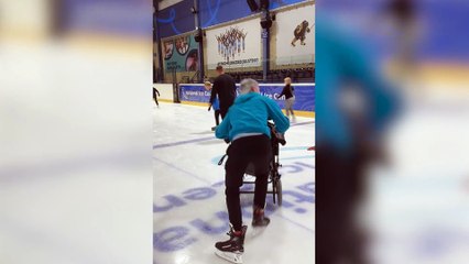 Boy with cerebral palsy lights up as stranger takes him for a spin on the ice