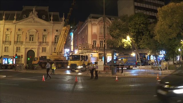 Workers lift wrecked Lisbon funicular from tracks after deadly crash