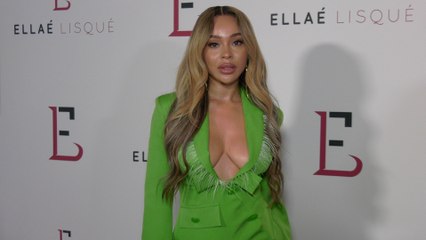 Danielle Howell attends "Ellaé Lisqué's 10th Anniversary Show" red carpet 