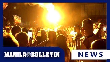 Tear gas is fired in Serbia at thousands of protesters demanding free elections and justice