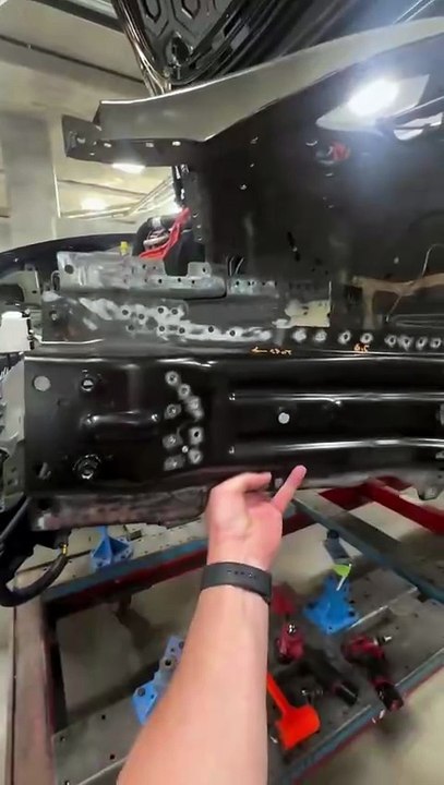 Tesla model 3 mounted on the Celette bench to ensure everything lines up correctly.