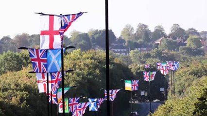 Group use cherry picker to erect over 40 UK flags on West Midlands lampposts along entire street