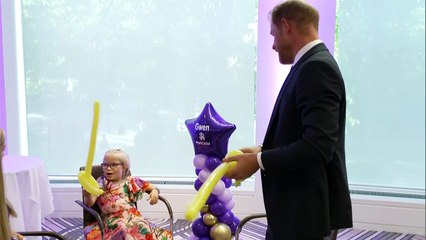 Prince Harry has balloon sword fight at WellChild Awards