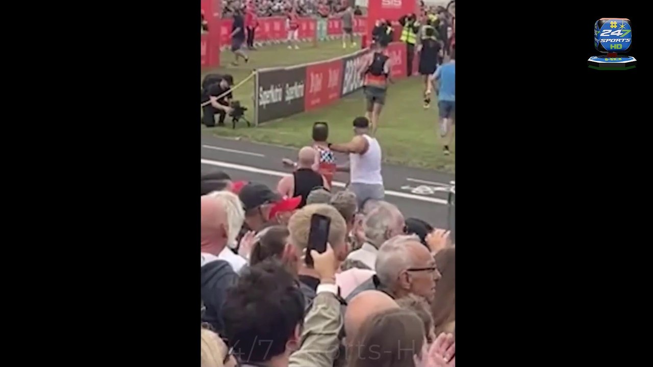 Tommy Fury is caught PUSHING Great North Run rival away to get his perfect viral finish line video