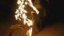 Crazy Guy Cycling with Fire