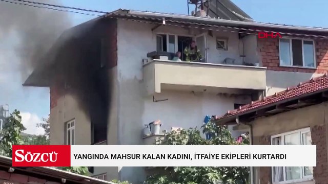 Yangında mahsur kalan kadını, itfaiye ekipleri kurtardı