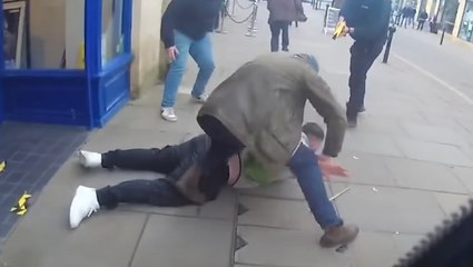 Gang of masked phone thieves burst into O2 store in violent high street raid