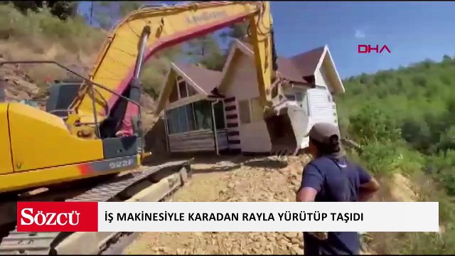Yıkım kararı verilen konteyner evini iş makinesiyle karadan rayla yürütüp taşıdı