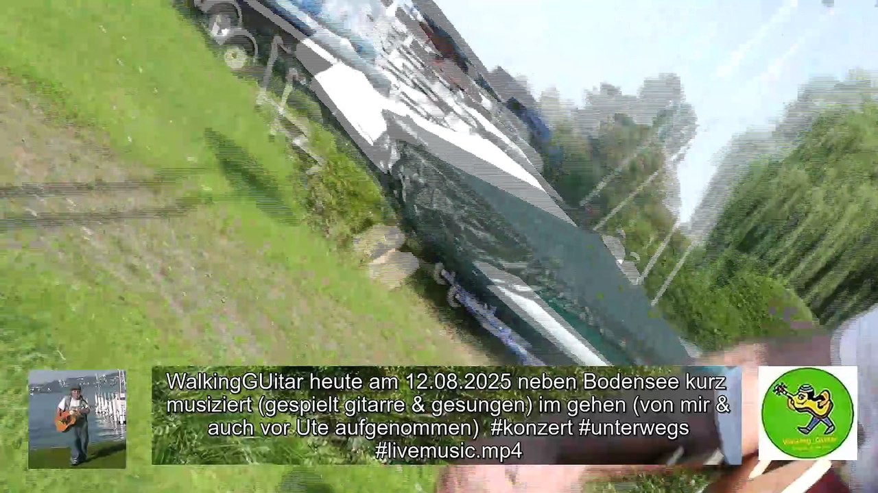 WalkingGuitar heute am 12.08.2025 neben #Bodensee beim #Konstanz  kurz musiziert (gespielt gitarre & gesungen) im gehen
