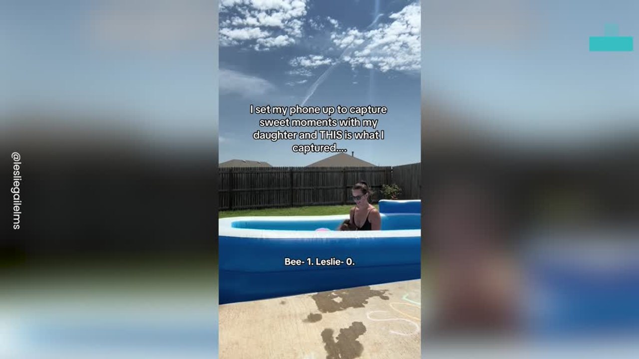 Mom Panics in Pool as Bee Interrupts Playtime
