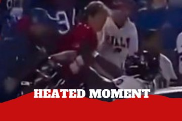 Lamar Jackson shoves fan after helmet slap