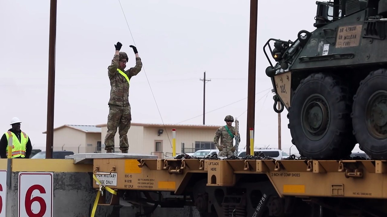 U.S. Soldiers offload and reposition approximately 50 M1126 Stryker armored vehicles during ongoing operations, showcasing the unit’s ability to rapidly deploy and maneuver combat power.