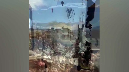New video captures Charlie Kirk's killer on the roof of a building moments before shooting him