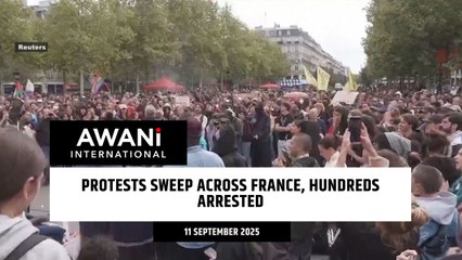 Protests sweep across France, hundreds arrested
