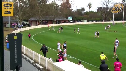 Fraser Ellis kicks a crucial goal in the fourth term