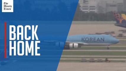 Plane carrying South Korean workers detained in US lands at Incheon airport