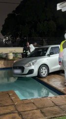 Taxi Accidentally Drives Into Pool In Rain