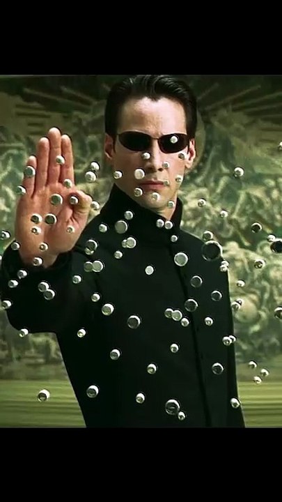 The-Matrix-Reloaded-Neo-Stops-Bullets-as-Trinity-Faces_1080p