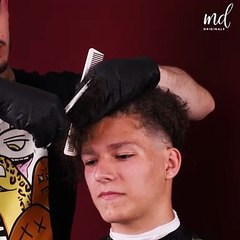 That long curly hair is gone