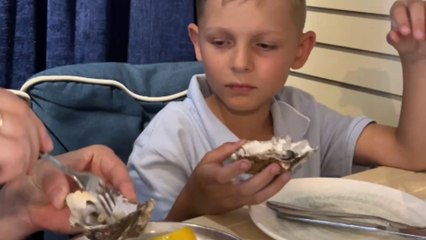 Boy tries oysters for the first time and instantly spits them out