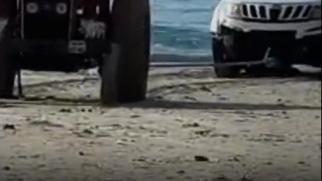 Men Stranded After Driving Car Into Sea