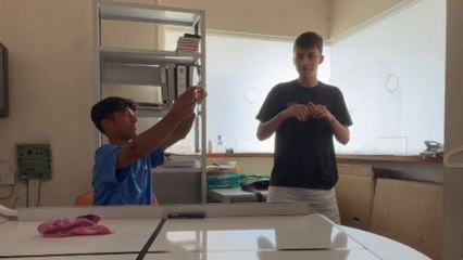 Lad takes an accidental hit to the face when bro underestimates his own strength