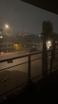 Strong Storm Sends Trashcans Flying Across Road in USA