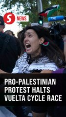 Pro-Palestinian protesters clash with police, force early end to Vuelta cycle race